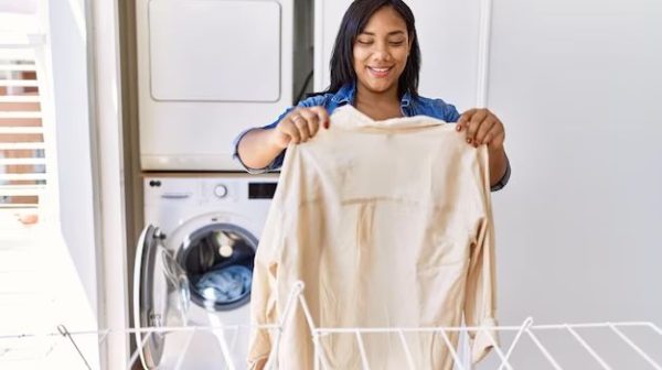 How do you hang a hanger in a laundry room?