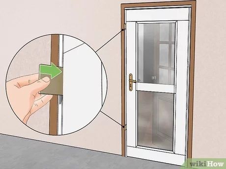 How do you adjust a slamming storm door