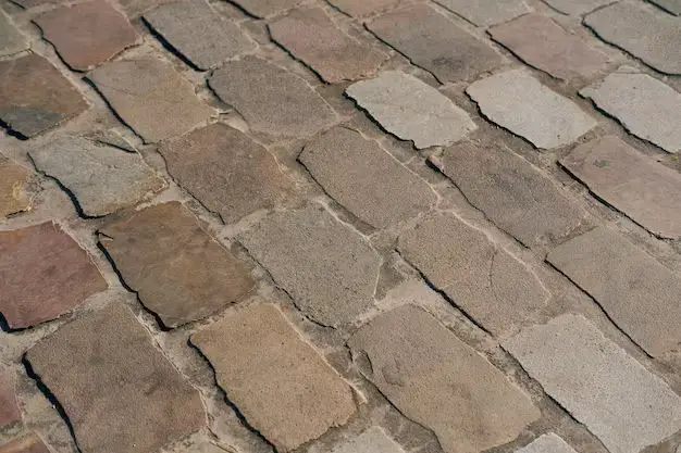 How do you fix uneven brick pavers