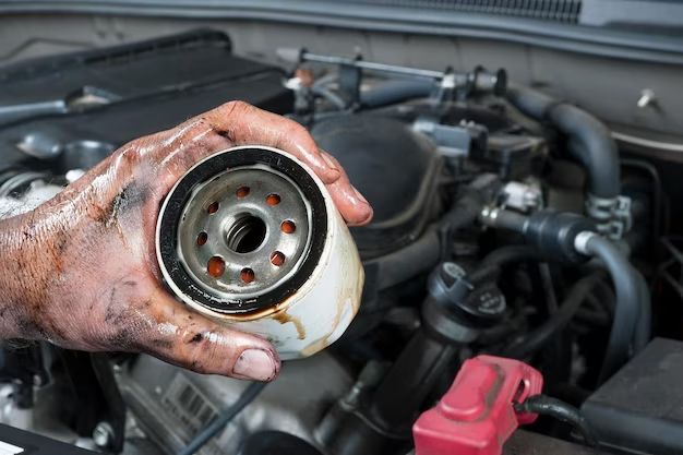 How do you loosen a tight oil filter