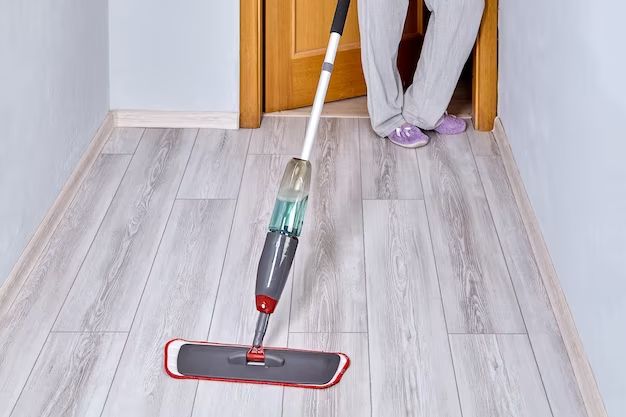 How do you clean dust off laminate flooring