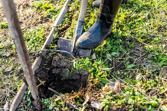 What is the fastest way to dig a fence post hole