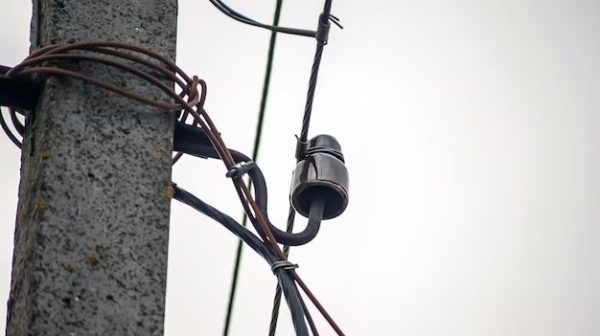 What is the black wire on a security light?