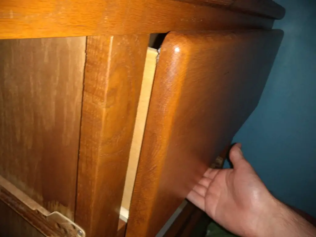 How do you unstick a stuck wooden drawer