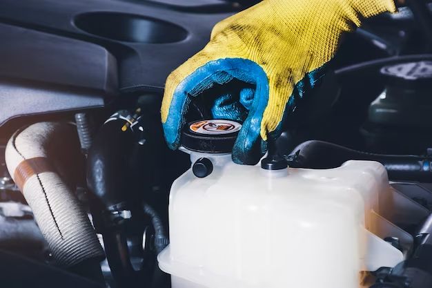 When should I replace my coolant reservoir