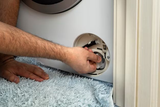 How do you clean an inlet filter on a washing machine