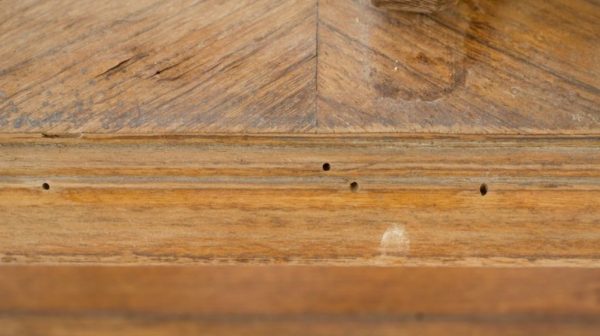 Can a hole on hardwood floor be repaired?