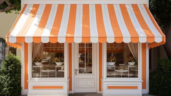 What is the difference between a door canopy and awning?