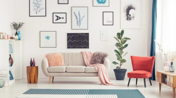 How do you hang pictures without damaging walls?