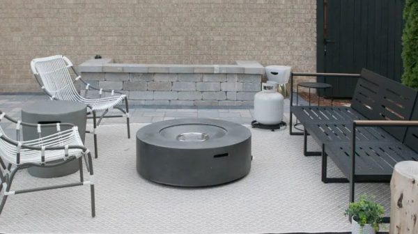 How do you hide a propane tank in a fire pit?