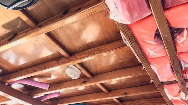 Is it hard to add wood beams to a ceiling?