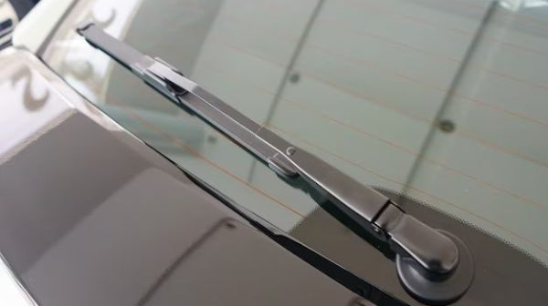 What is the best way to remove a windshield wiper arm?