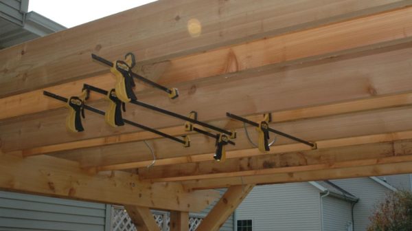 How do you hide wires on a pergola?