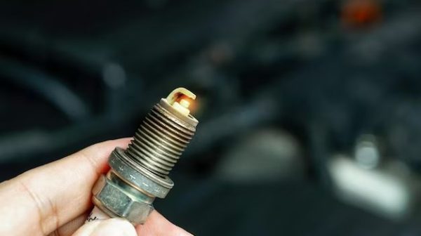 What tools do you need to change a spark plug?