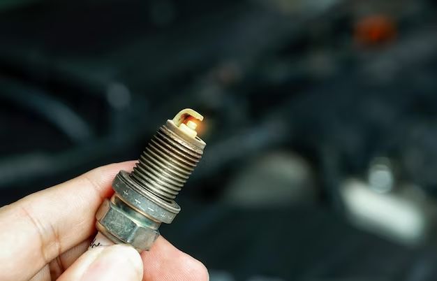 What tools do you need to change a spark plug